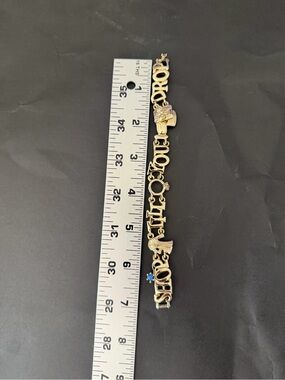 Gold Tone 'Shop Til You Drop' Charm Bracelet